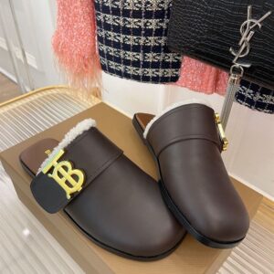 BURBERRY MONOGRAM DETAIL SHEARLING-LINED LEATHER MULES - U021