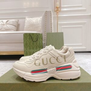 GUCCI RHYTON GUCCI LOGO LEATHER SNEAKER - G111