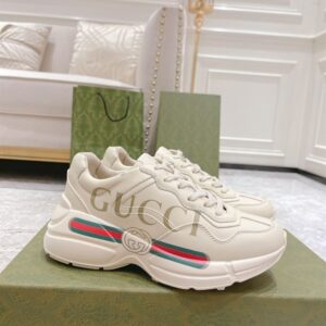 GUCCI RHYTON GUCCI LOGO LEATHER SNEAKER - G111