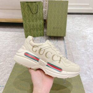 GUCCI RHYTON GUCCI LOGO LEATHER SNEAKER - G111