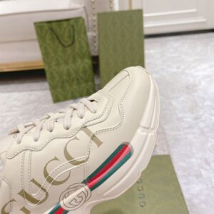 GUCCI RHYTON GUCCI LOGO LEATHER SNEAKER - G111