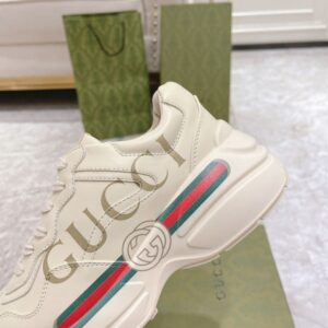 GUCCI RHYTON GUCCI LOGO LEATHER SNEAKER - G111