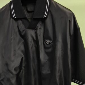 PRADA PIQUE POLO SHIRT WITH RE-NYLON DETAIL - A004