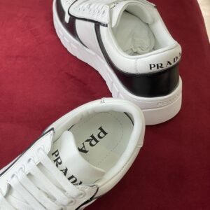 PRADA VOLUMINOUS SNEAKERS WHITE BLACK - P062